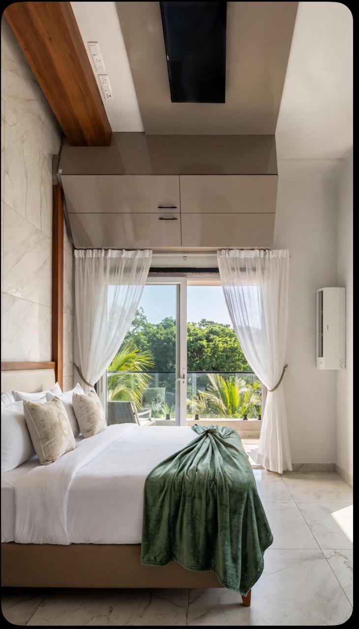 Balcony room with sliding doors and sheer curtains